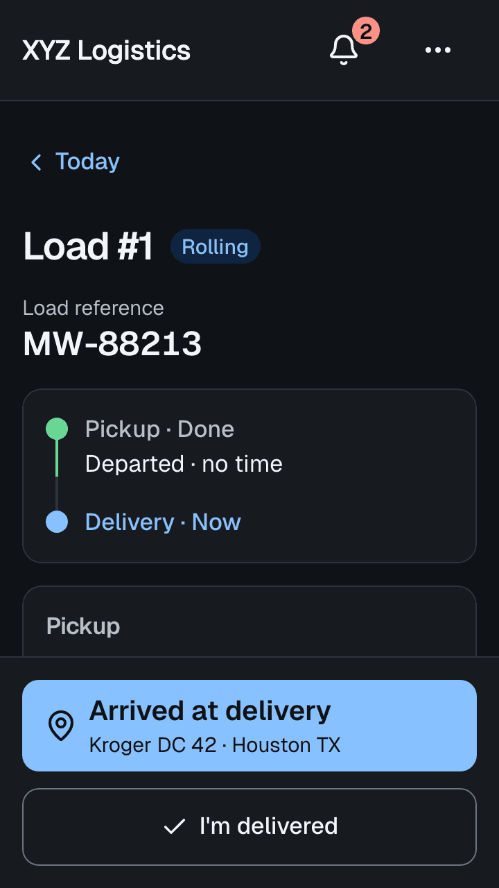 A driver's phone showing Load #1 in transit: pickup done, delivery next, and one big button to tap on arrival at Kroger DC 42.