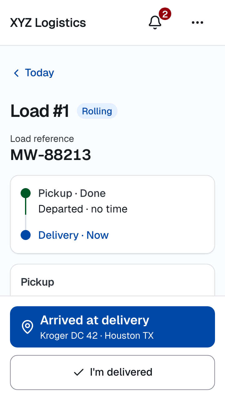 A driver's phone showing Load #1 in transit: pickup done, delivery next, and one big button to tap on arrival at Kroger DC 42.